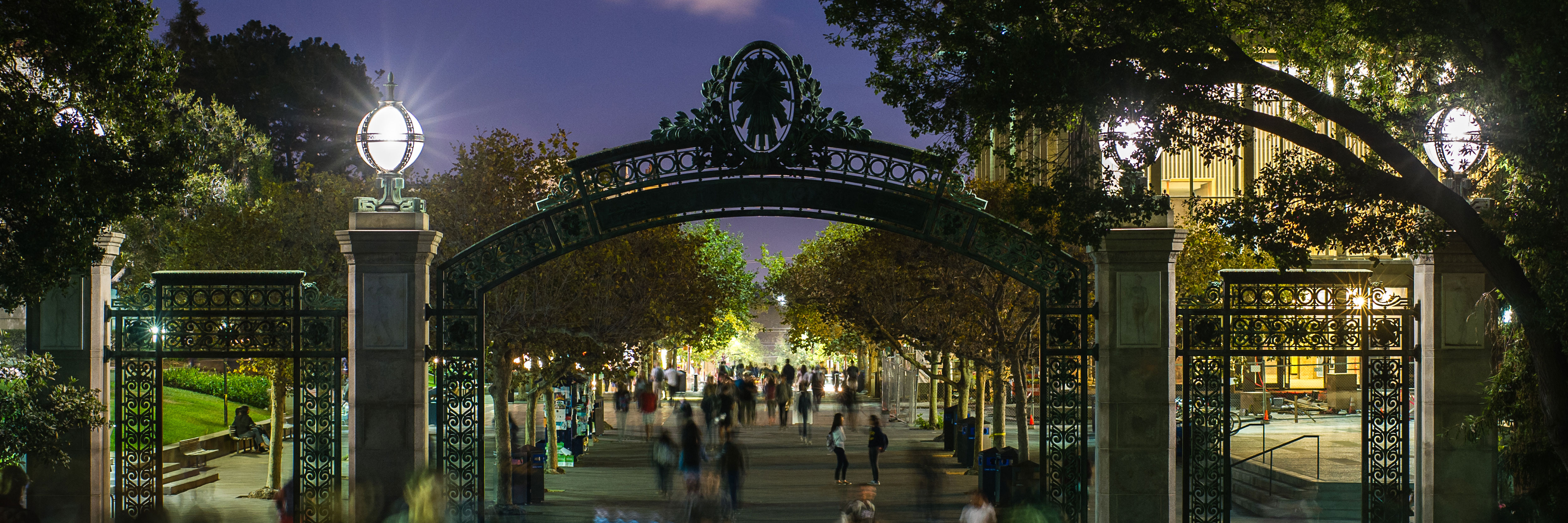 A gate at night