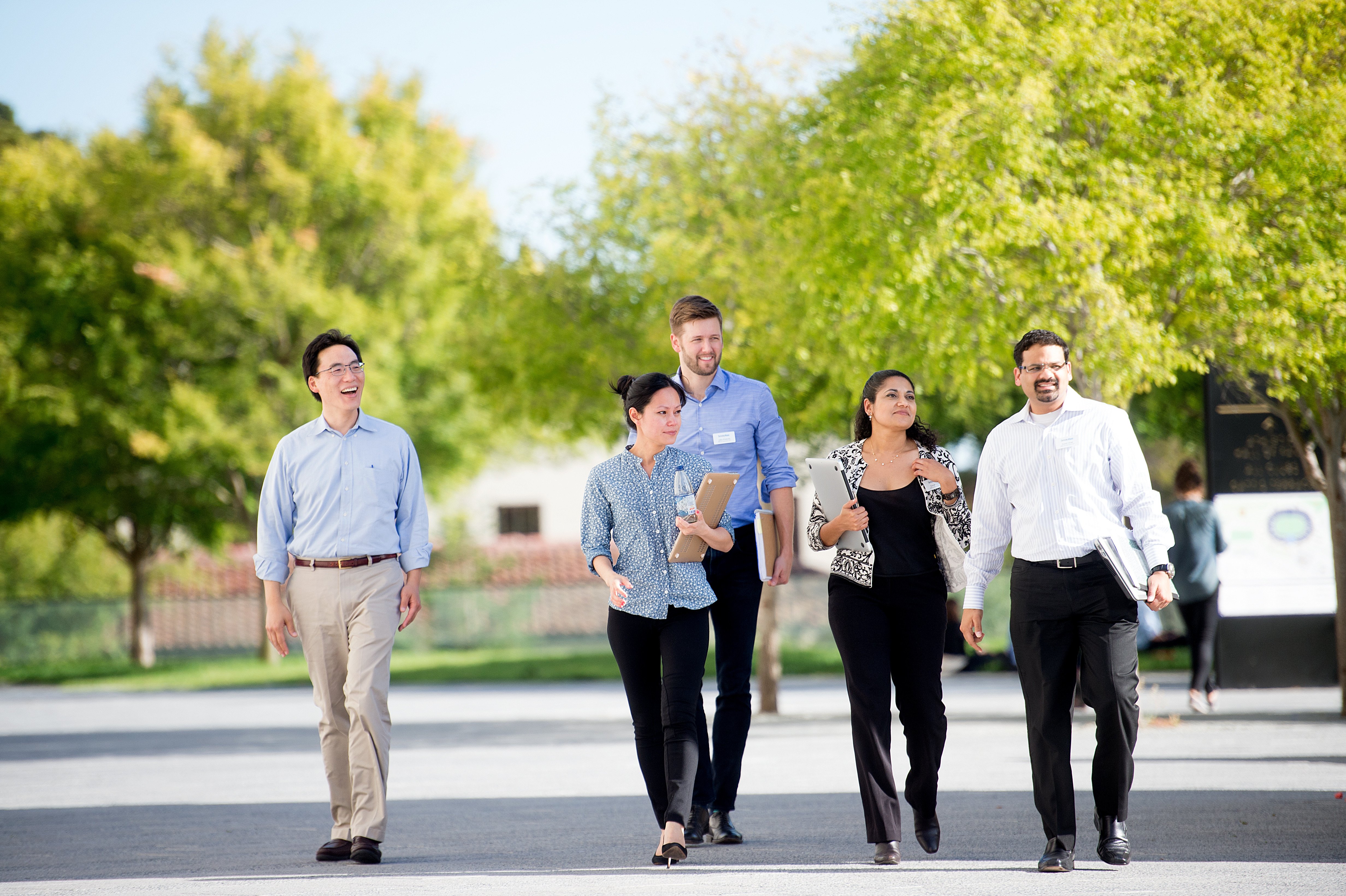 Students walk through campus together