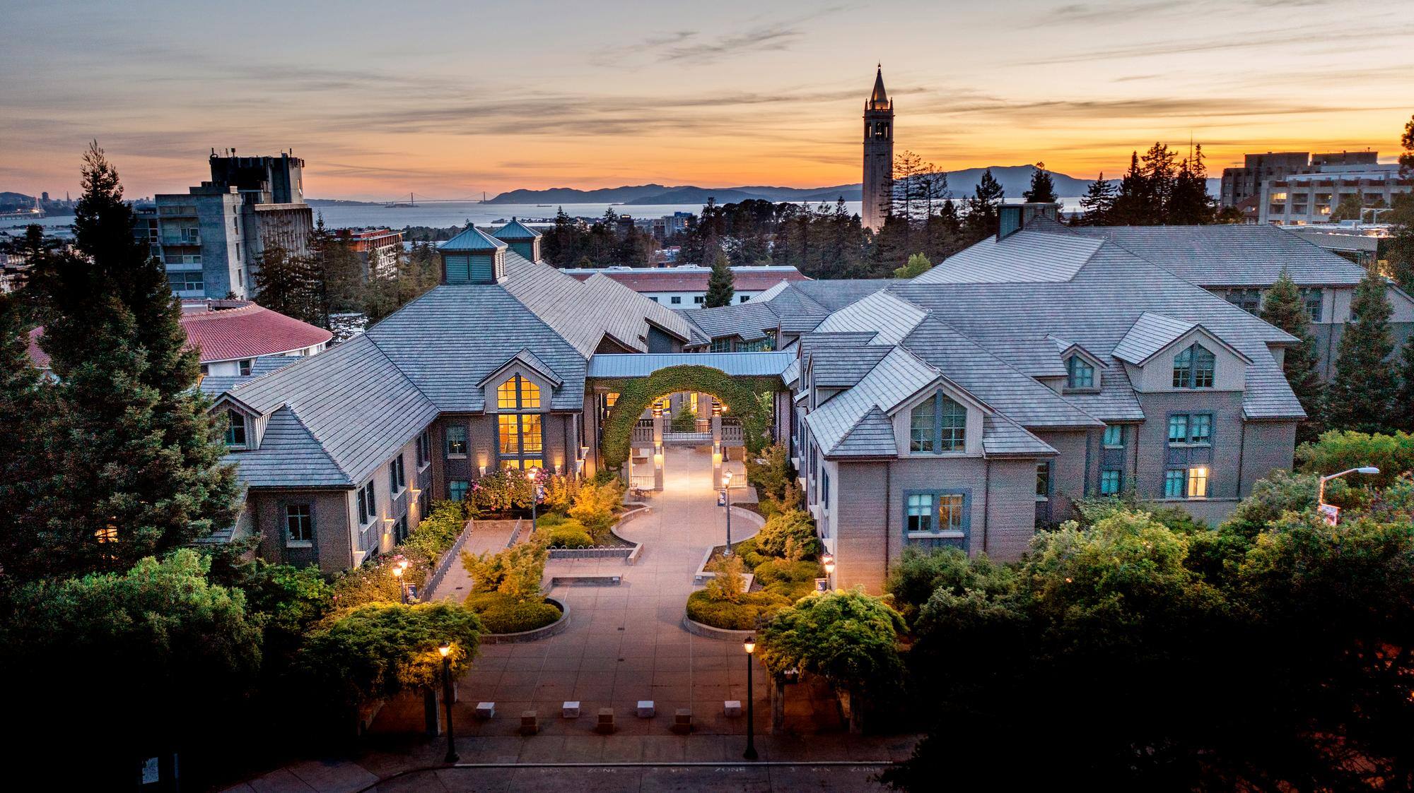 Berkeley Haas campus lit up during sunset