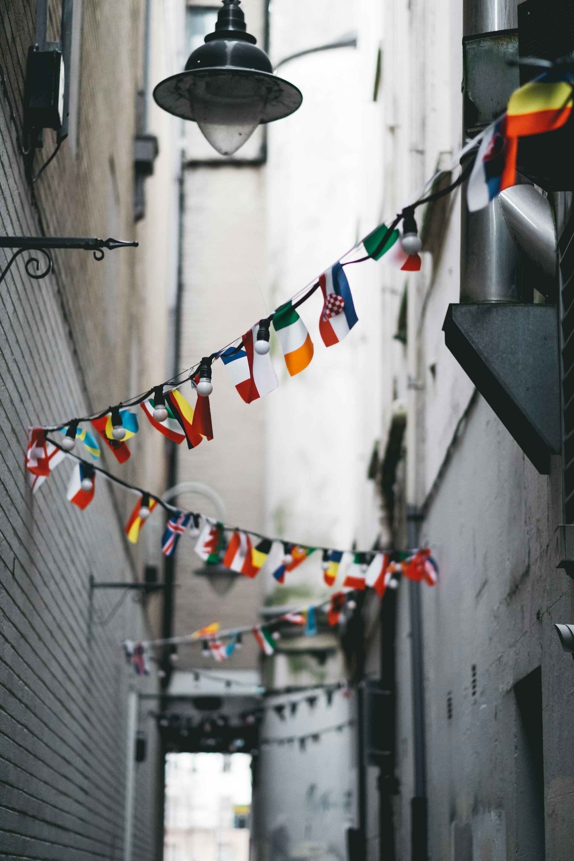 Flags hanging in an alley